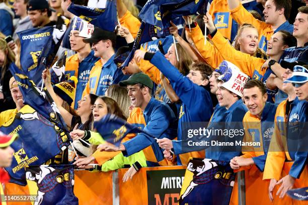 Highlander supporters in the Zoo react during the round 8 Super Rugby match between the Highlanders and Hurricanes at Forsyth Barr Stadium on April...