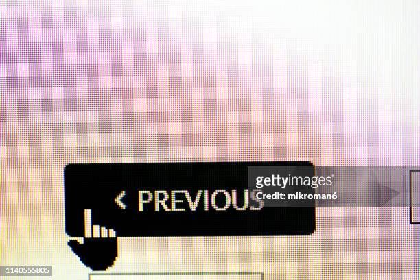 cursor pointing to previous on a computer screen - former stock pictures, royalty-free photos & images