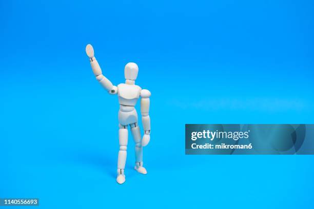 wooden mannequin gesturing hold on stop - hey - geste stop stock pictures, royalty-free photos & images