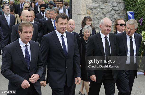 Chief Executive of The European Tour George O'Grady Nick Faldo of England , Roger Chapman of England and Colin Montgomery of Scotland walk following...