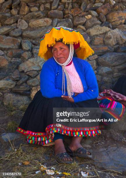 Woman in traditional clothing, Qoyllur Riti festival, Ocongate Cuzco, Peru on May 26, 2013 in Ocongate Cuzco, Peru.