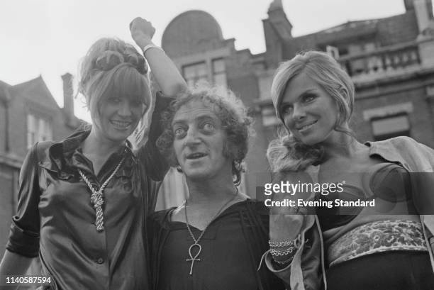 English actress and model Vicki Hodge, British actor, comedy writer, and comedian Marty Feldman , and Norwegian actress and model Julie Ege , UK,...