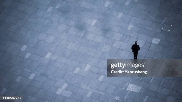 one blur people walk on across the pedestrian - bovenkleding stockfoto's en -beelden