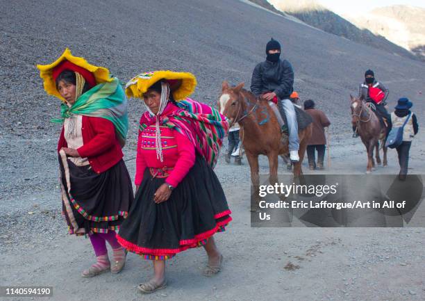 Peruvian people climbing to the Qoyllur Riti festival, Ocongate Cuzco, Peru on May 27, 2013 in Ocongate Cuzco, Peru.