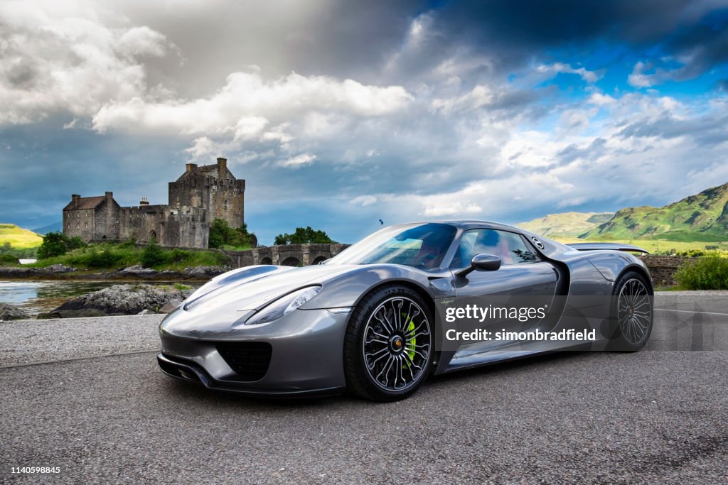 Porsche 918 At Eilean Donan Castle In Scotland