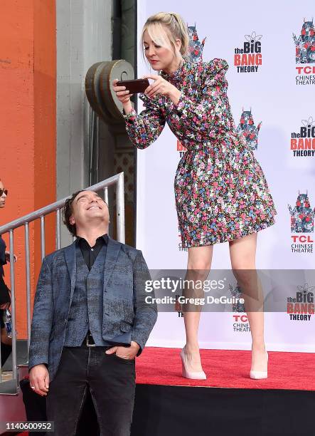 Johnny Galecki and Kaley Cuoco of The Cast Of "The Big Bang Theory" Place Their Handprints In The Cement At The TCL Chinese Theatre IMAX Forecourt on...