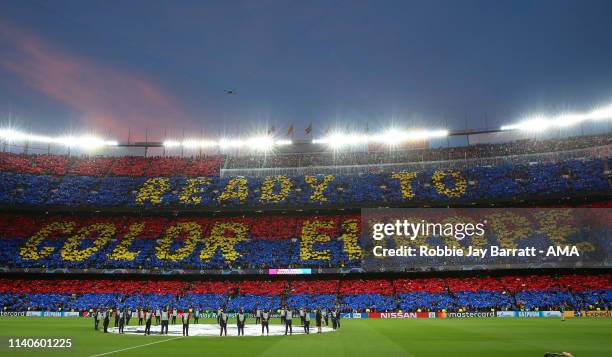 Fans of FC Barcelona make a mosaic with Ready To Color Europe in the Nou Camp Stadium prior to the UEFA Champions League Semi Final first leg match...