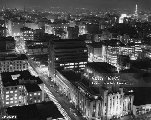 Night-time view over downtown Los Angeles, California, with the Los Angeles Times building at lower right, 1961.