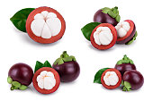 ripe mangosteen with leaves isolated on white background closeup. Set or collection