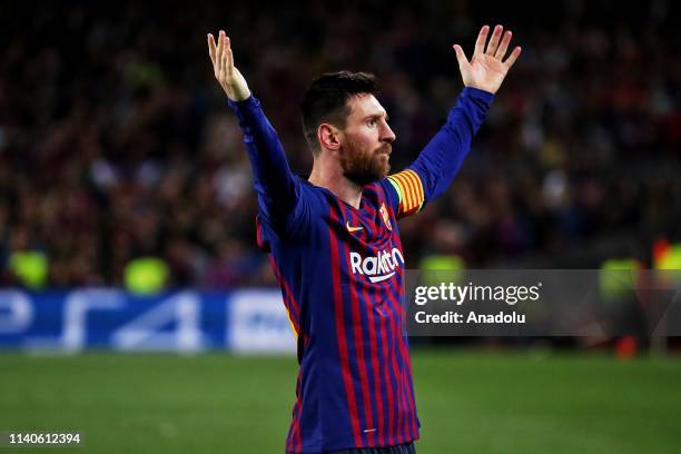Barcelona's Argentinian forward Lionel Messi celebrates after scoring a goal during semi finals of UEFA Champions League football match between FC...