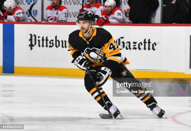 Adam Johnson of the Pittsburgh Penguins skates against the Carolina Hurricanes at PPG Paints Arena on March 31, 2019 in Pittsburgh, Pennsylvania.