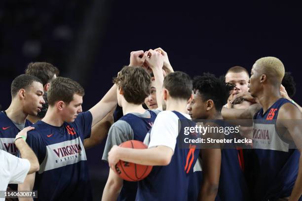 The Virginia Cavaliers huddle during practice prior to the 2019 NCAA men's Final Four at U.S. Bank Stadium on April 5, 2019 in Minneapolis, Minnesota.