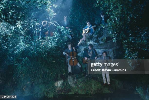 British post-punk group Echo And The Bunnymen perform in a park circa 1984.