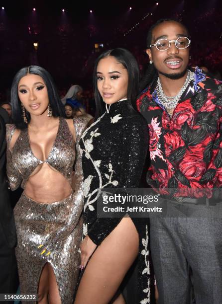 Cardi B, Saweetie, and Quavo of Migos attend onstage during the 2019 Billboard Music Awards at MGM Grand Garden Arena on May 1, 2019 in Las Vegas,...