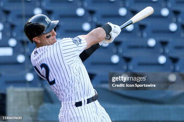 Troy Tulowitzki of the Tarpons hits a single to left in the first inning during the Florida State League game between the Charlotte Stone Crabs and...