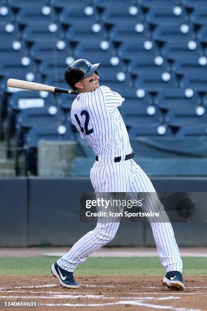 Troy Tulowitzki of the Tarpons hits a single to left in the first inning during the Florida State League game between the Charlotte Stone Crabs and...