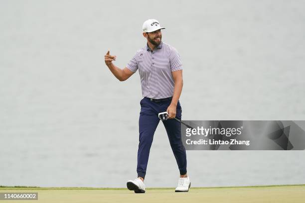 Erik Van Rooyen of South Africa celebrates after playing a shot during day 1 of the 2019 Volvo China Open at Genzon Golf Club on May 2, 2019 in...