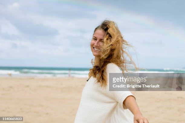44 years old women having fun in beautiful hawaii - summer hair care stock pictures, royalty-free photos & images