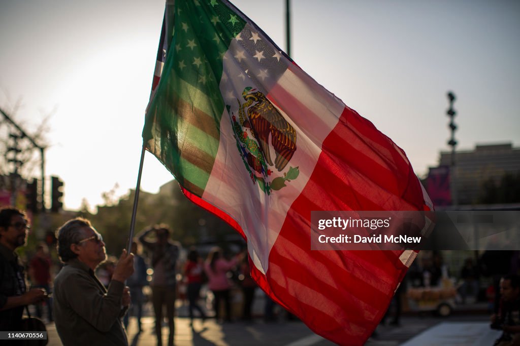 Activists March On International Workers' Day Calling For Immigrant Workers' Rights