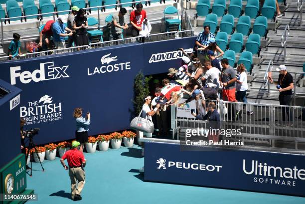Roger Federer signs autographs after practicing for a match.2019 is the first year that the Miami Open Tennis tournament was held at the Hard Rock...