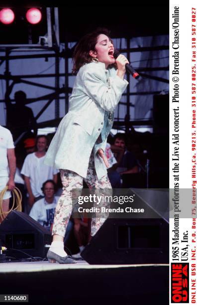 Madonna performs at the Live Aid concert.