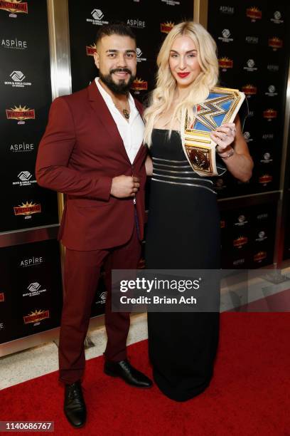 Superstars Andrade and Charlotte Flair attend the WWE Superstars For Hope Reception on April 05, 2019 in New York City.