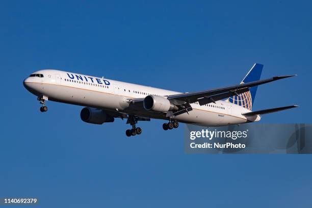 United Airlines Boeing 767-400 ER Extended Range with 2x CF6-80 engines aircraft landing at Amsterdam Schiphol International Airport AMS EHAM in The...