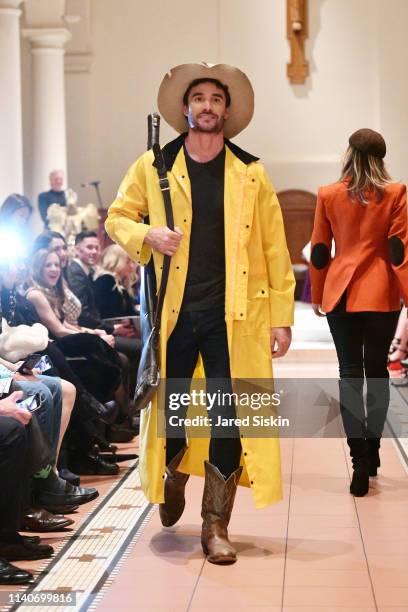 Model walks the runway during the Dressed To Kilt celebrity fashion show and cocktail party on April 05, 2019 at Church of the Holy Apostles in New...