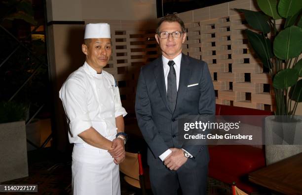 Shark by Bobby Flay sushi chef Kiyo Asano and chef Bobby Flay attend the grand opening celebration of Of SHARK By Bobby Flay at the Palms Casino...