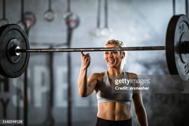 i can lift this barbell with my finger! - effortless stock pictures, royalty-free photos & images