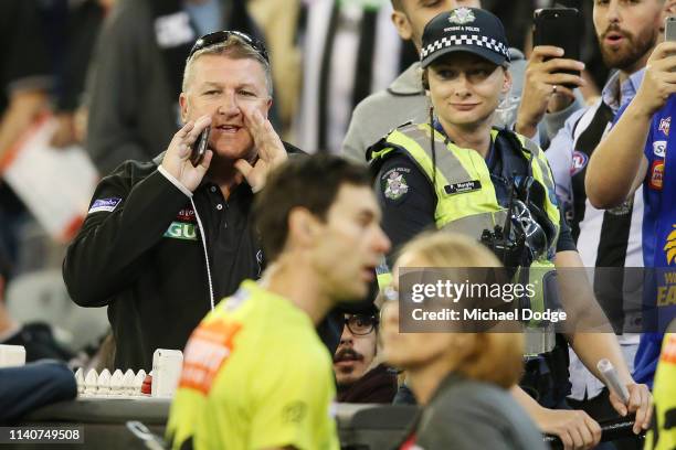 Magpies fan abuses the umpires at half time during the round three AFL match between the Collingwood Magpies and the West Coast Eagles at Melbourne...