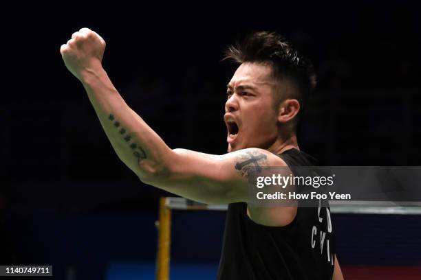 Lin Dan of China celebrates after defeating Shi Yuqi of China in the semi finals on day five of the Badminton Malaysia Open at Axiata Arena on April...