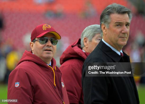 Washington Redskins owner Dan Snyder, left, with team president Bruce Allen, right, before a game between the Washington Redskins and the...