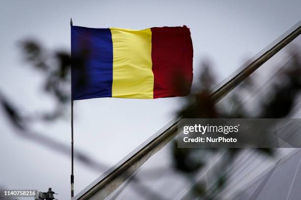 The Romanian flag is seen on the roof of the Victoria Palace in Bucharest, Romania on May 1, 2019.