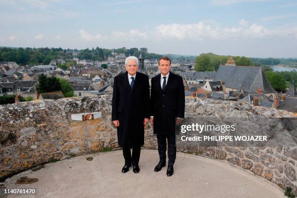 French President Emmanuel Macron and Italian President Sergio Mattarella pose for a picture during a visit of the Chateau d'Amboise to commemorate...