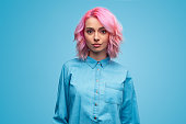 Modern millennial woman with pink hair