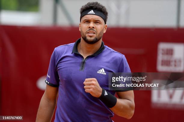 France's Jo-Wilfried Tsonga reacts during his men's singles 3rd round match against Monaco's Hugo Nys on day 4 of the ATP Challenger Tour tennis...