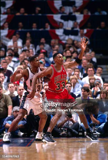 Kendall Gill of the New Jersey Nets and Scottie Pippen# of the Chicago Bulls fight for position during Game Three of Round One of the 1998 NBA...