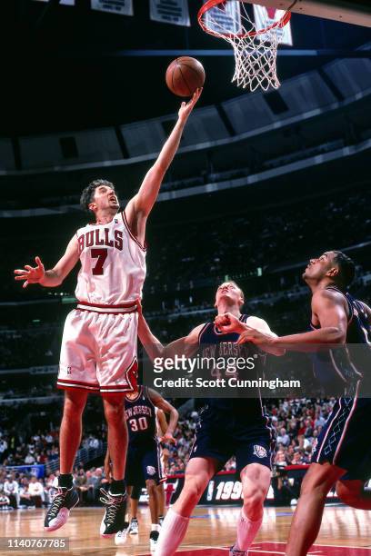Toni Kukoc of the Chicago Bulls shoots the ball against the New Jersey Nets during Game Two of Round One of the 1998 NBA Playoffs on April 26, 1998...