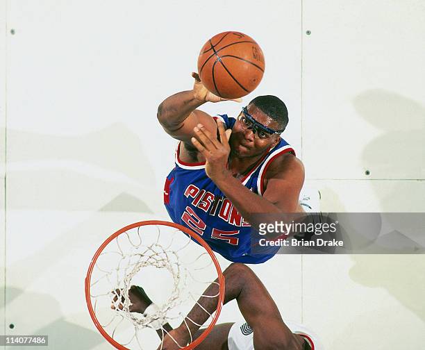 Oliver Miller of the Detroit Pistons shoots against the Portland Trailblazers at the Veterans Memorial Coliseum in Portland, Oregon circa 1994. NOTE...