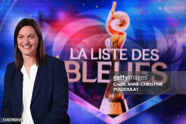 France's football team head-coach Corinne Diacre smiles prior to announcing her 23-woman squad for the World Cup 2019 football tournament during the...
