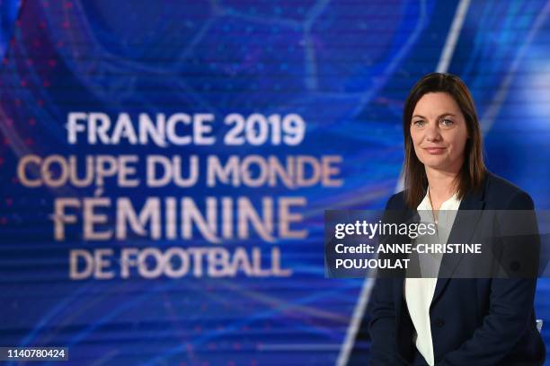 France's football team head-coach Corinne Diacre looks on prior to announcing her 23-woman squad for the World Cup 2019 football tournament during...