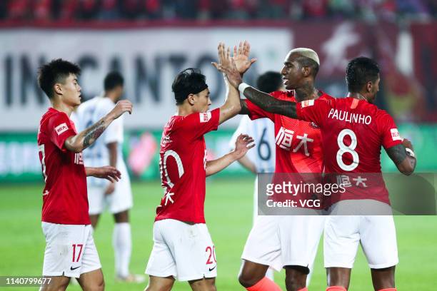 Talisca of Guangzhou Evergrande celebrates with team mates after scoring a goal during the fourth round match of 2019 Chinese Football Association...