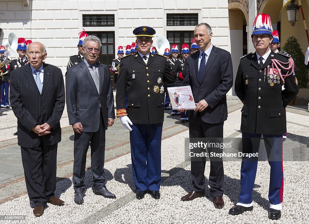 Prince Albert II Of Monaco receives a book on the Prince's Guard ...