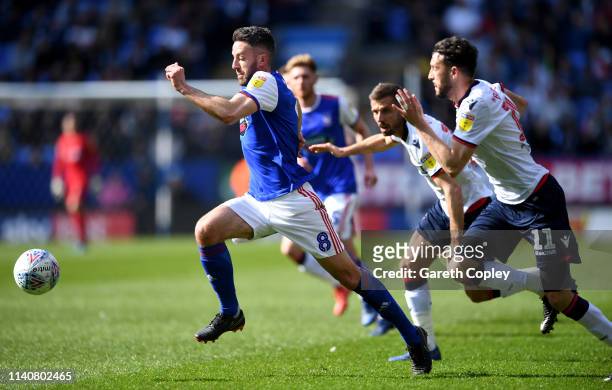 Cole Skuse of Ipswich Town gets past Will Buckley of Bolton during the Sky Bet Championship match between Bolton Wanderers and Ipswich Town at Macron...