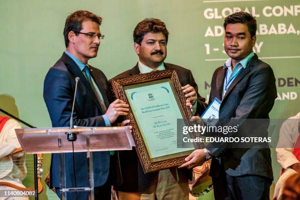 Moez Chakchouk, assistant Director-General for Communication and Information of Unesco, Hamid Mir, journalist and member of the jury, and Thura Aung,...