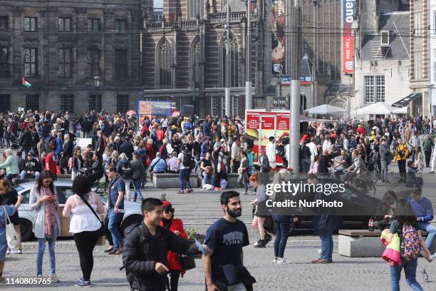 Dam Square in Amsterdam, a town square in the Dutch capital. Dam Square is a popular historic market square in the center of the city for locals and...