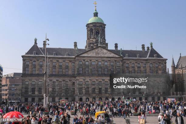 Dam Square in Amsterdam, a town square in the Dutch capital. Dam Square is a popular historic market square in the center of the city for locals and...