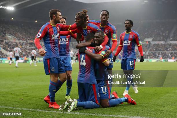 Luka Milivojevic of Crystal Palace celebrates after scoring his team's first goal from the penalty spot wit his team mates during the Premier League...