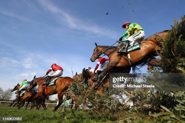 Burke riding clears the Canal Turn during the Randox Health Grand National Handicap Chase at Aintree Racecourse on April 06, 2019 in Liverpool,...